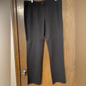 Beta and black stretch pants.